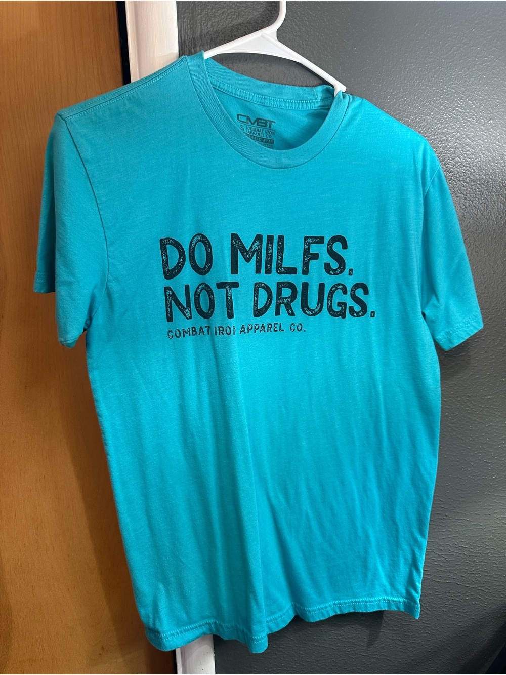 Source Unknown Teal Graphic Tee - Black Slogan